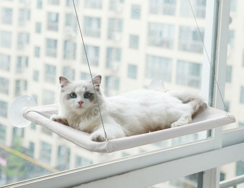 Hængekøje til kat i vinduet