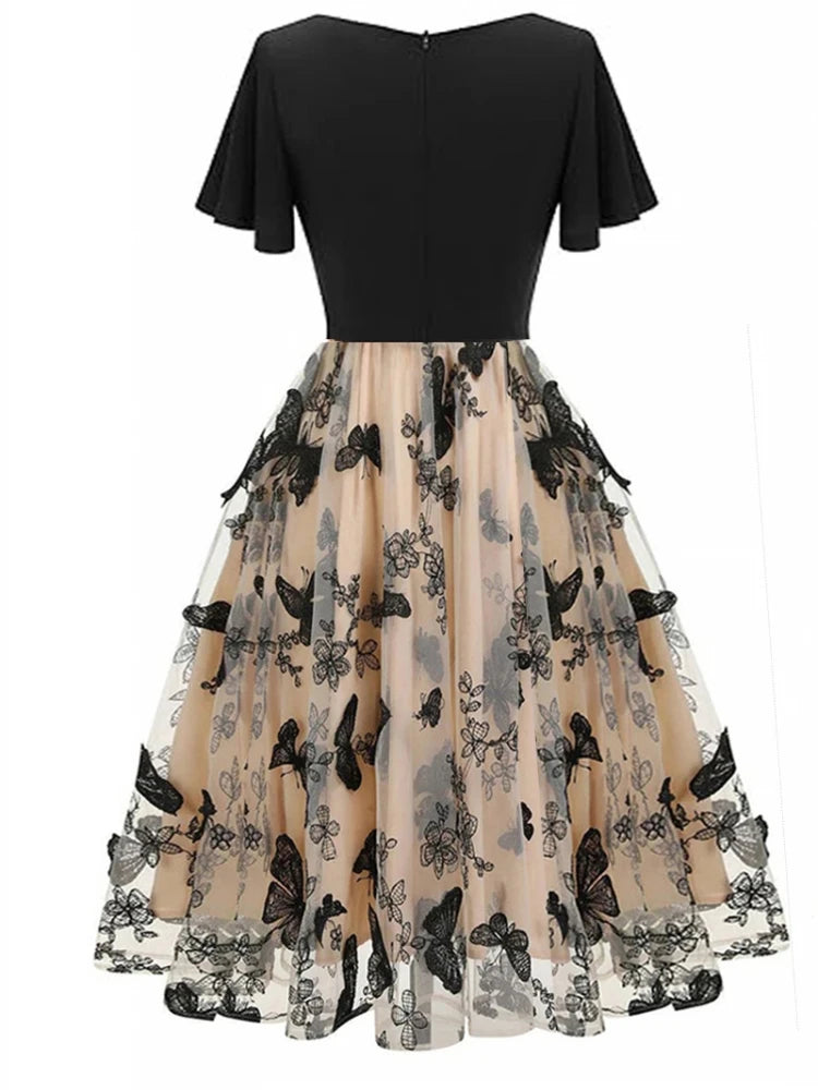 Festkjole i broderet mesh til kvinder