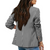 Dobbeltradet houndstooth-blazer til kvinder