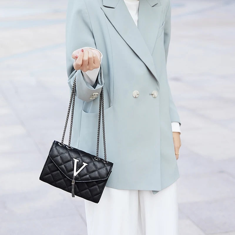 Luksus quiltet crossbody-taske med kvast
