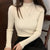 Strikket pullover med mock neck til kvinder