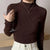 Strikket pullover med mock neck til kvinder