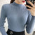 Strikket pullover med mock neck til kvinder